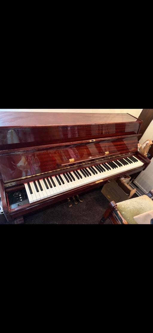 — Electric piano