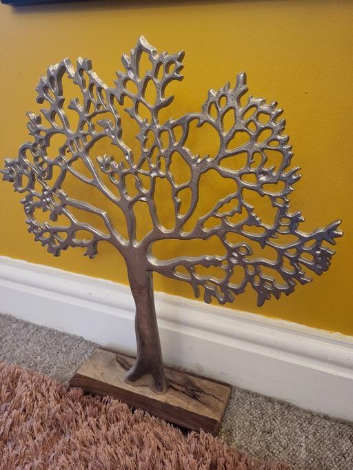  — Metal tree ornament