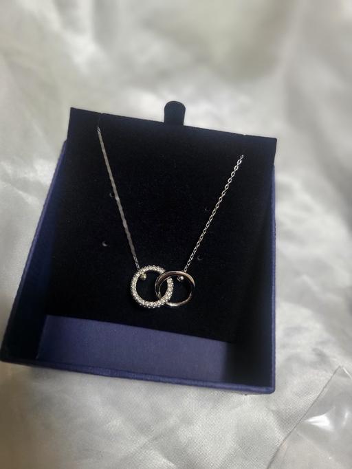  — Swarowski. Dextera pendant Interlocking loop.
