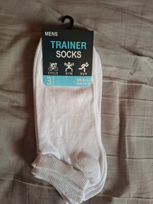  — TRAINER SOCKS