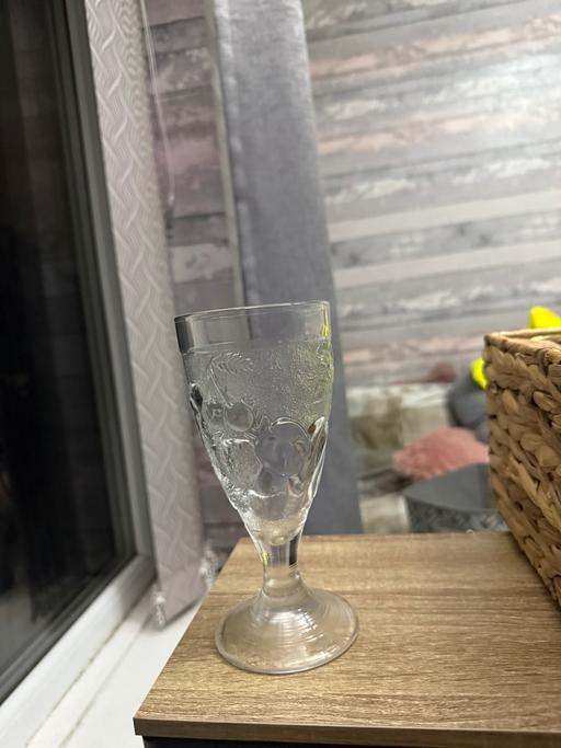  — 4 of them clear glass footed dressert