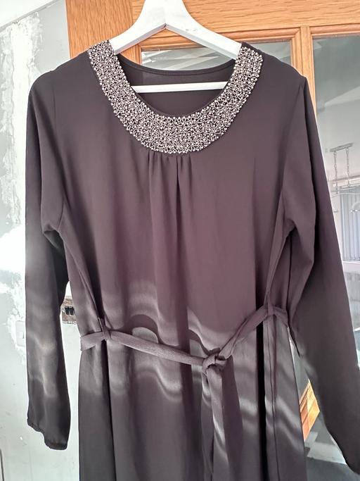  — Dress English