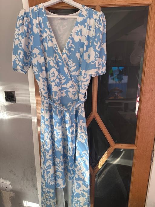  — Dress