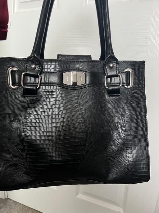  — Ladies black handbag