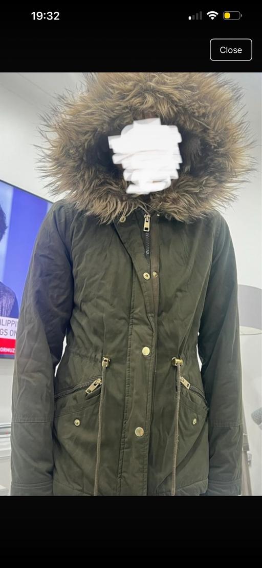  — Coat