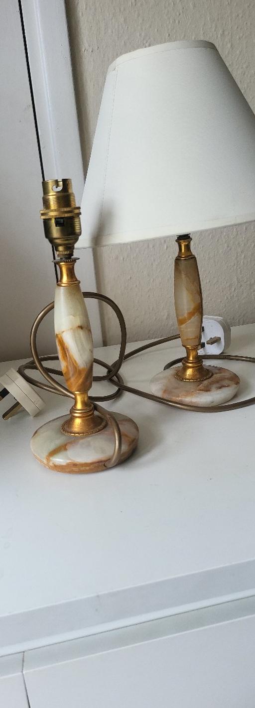  — A pair of vintage onyx lamps