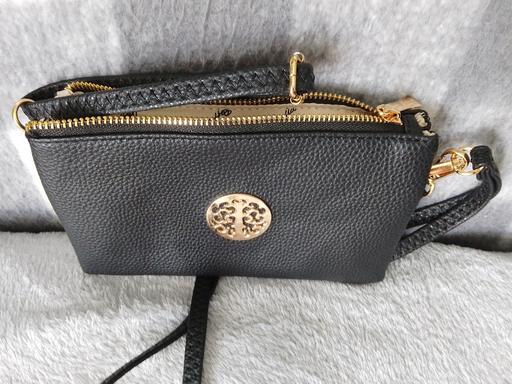  — Small clutch bag