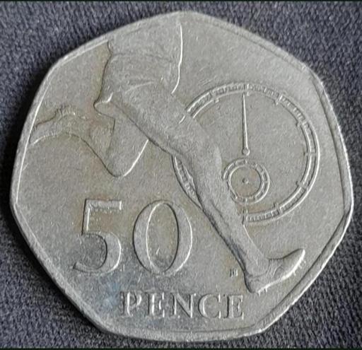  — ROGER BANNISTER
4 MINUTE MILE 50p COIN 2004
