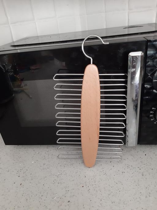  — tie hanger