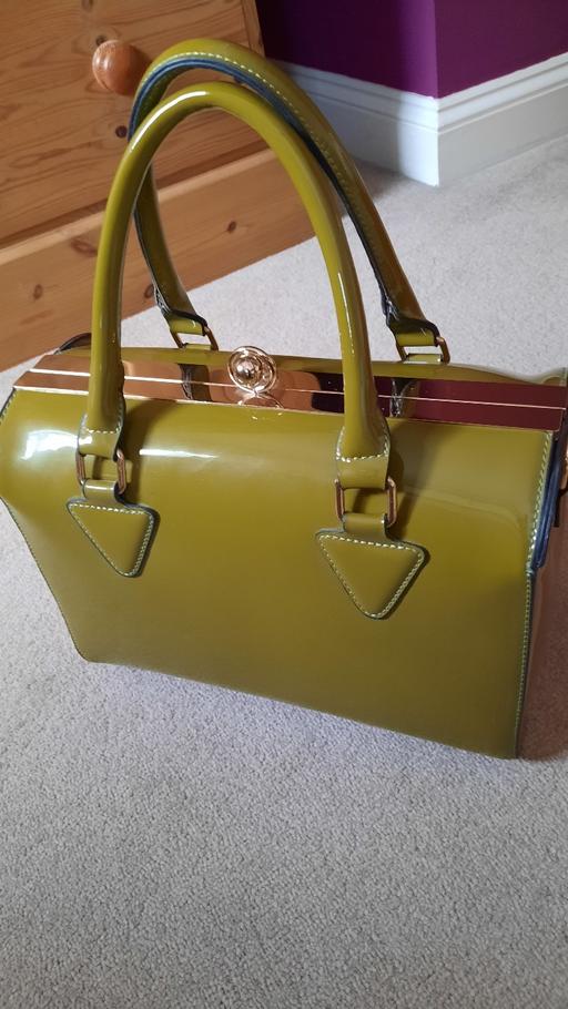  — Handbag