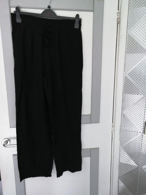 — ladies Trousers size *M*