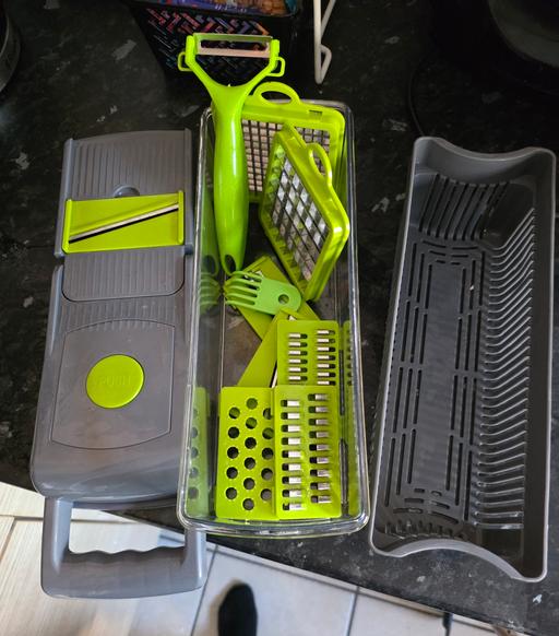  — multi use utensil