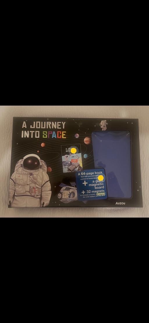  — Magnetic board book and magnets