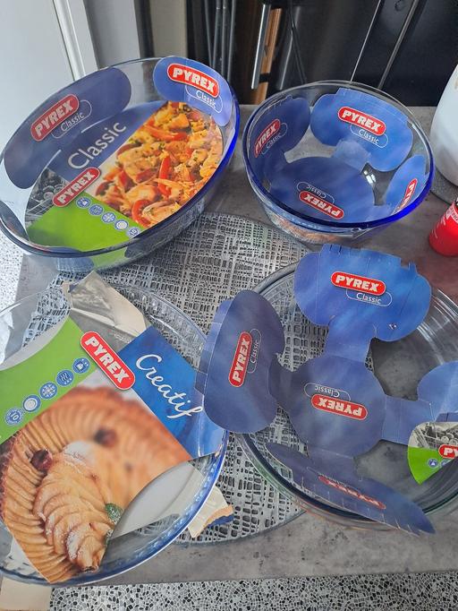  — 4 large pyrex dishes new