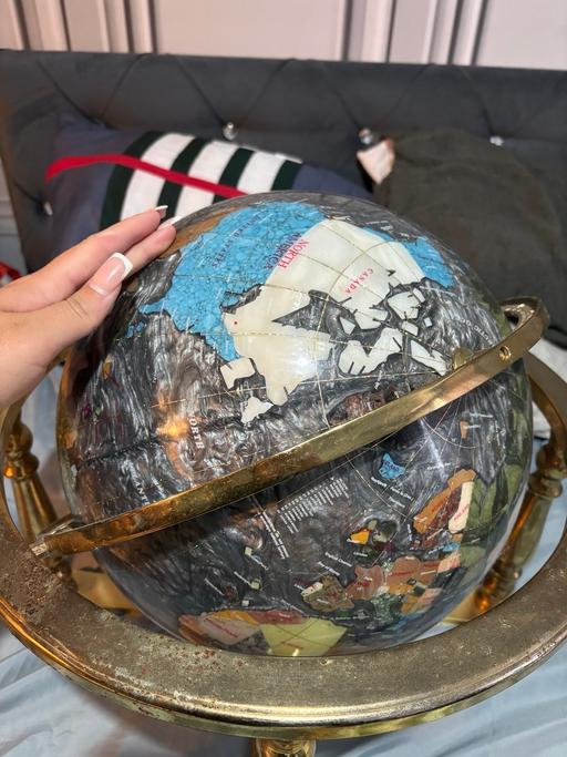  — Decorative gemstone globe with brass stand