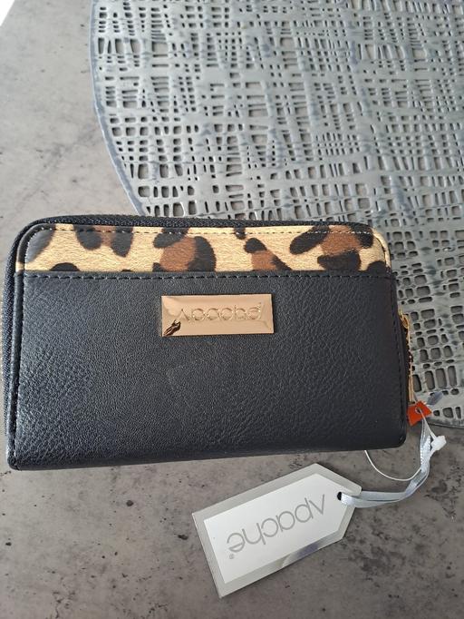  — new purse