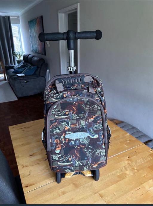  — Scooter micro