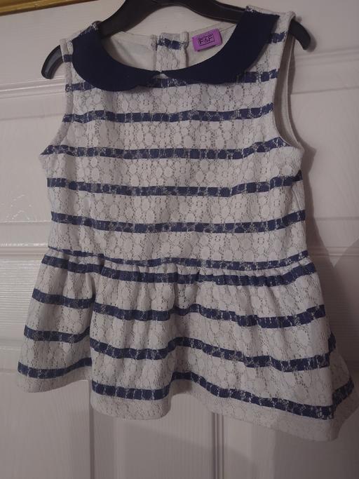  — Girls white/navy top size 3-4 years