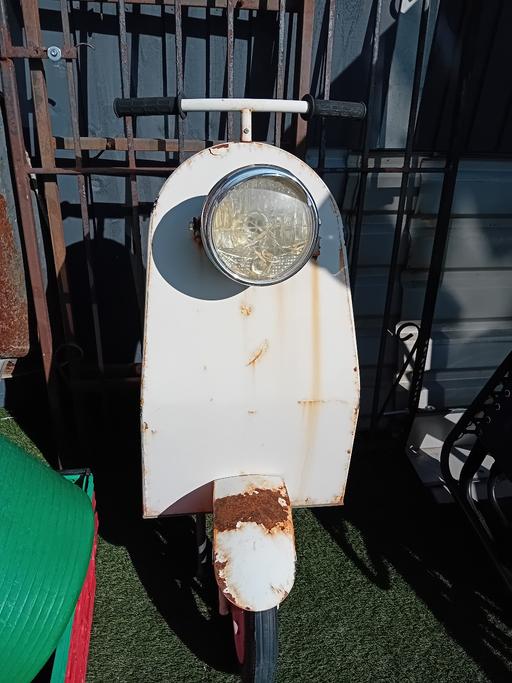  — scooter plant stand