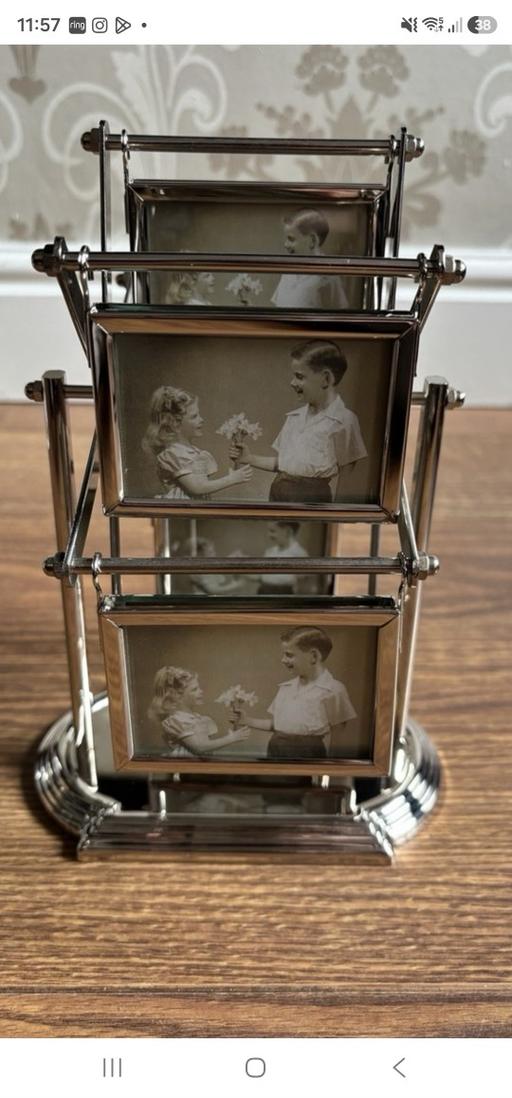  — Rotating multi-frame desktop carousel