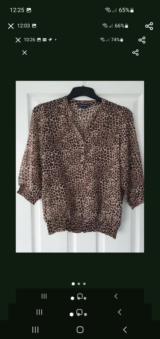  — ladies animal print blouse