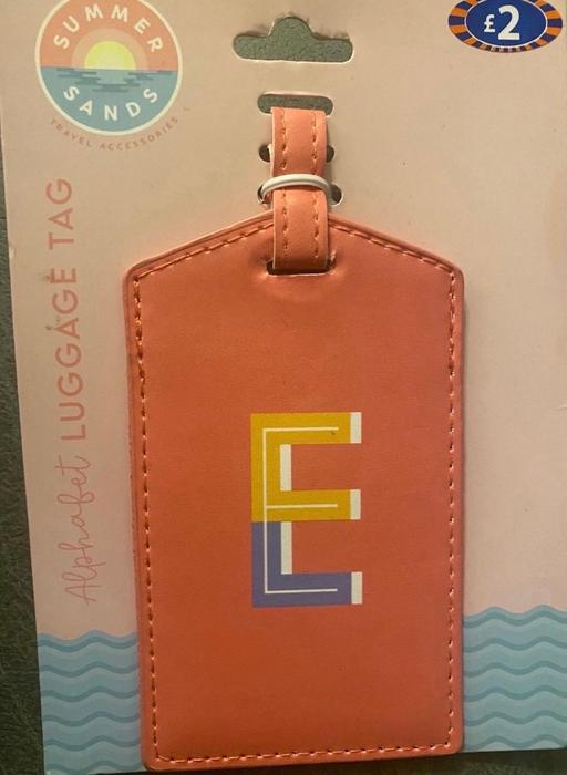  — Luggage tag initial letter E
