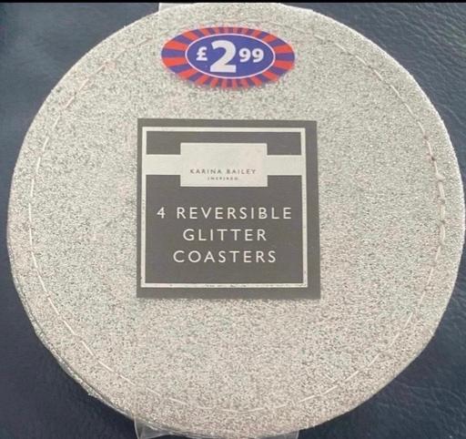 — Silver reversible coasters