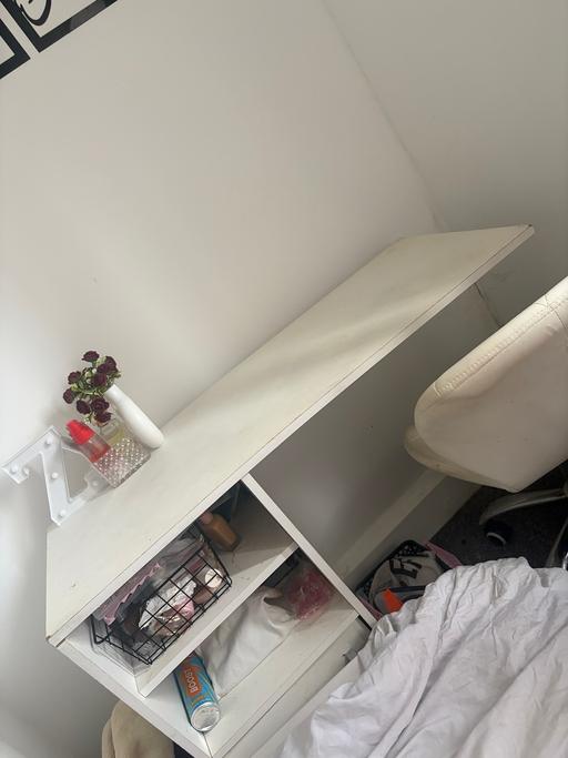  — Table including chair