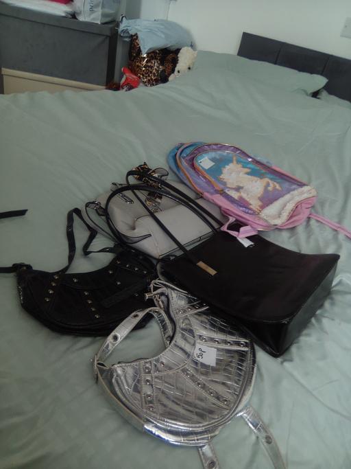  — handbags