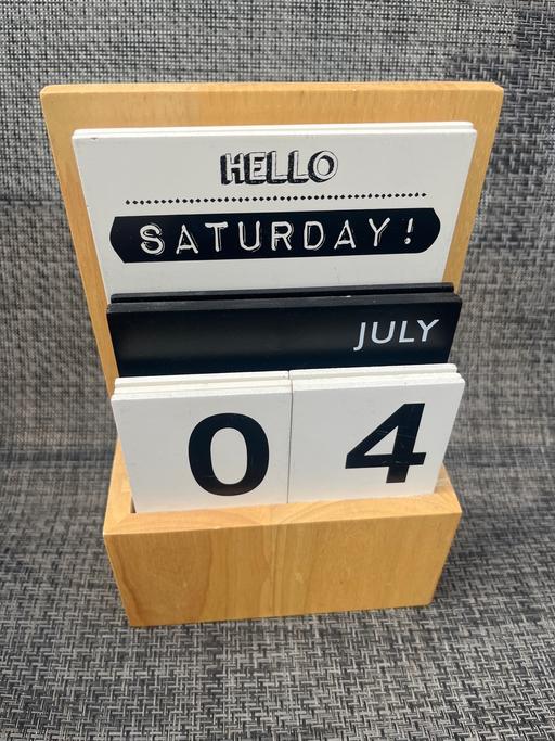  — Wood changing Calendar