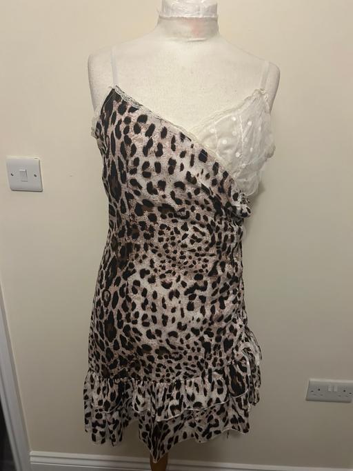  — Leopard print dress . Size 12 . New