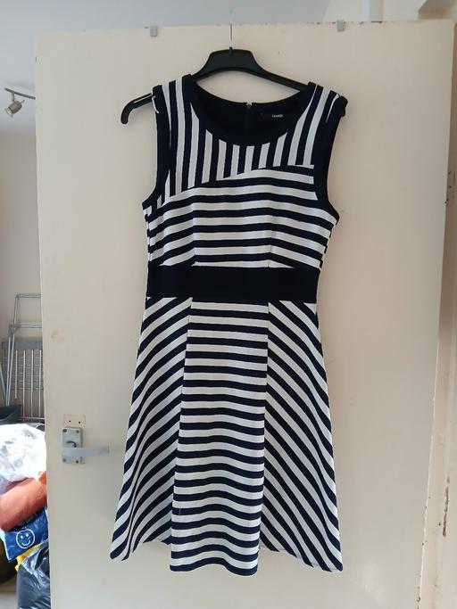  — Dress