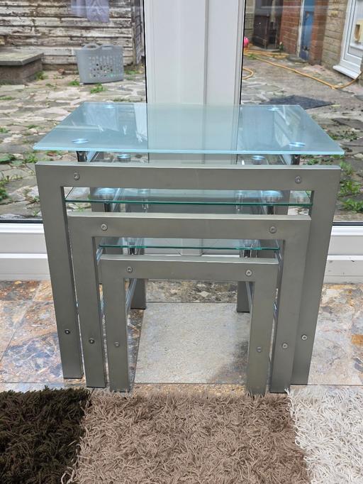  — nest of 3 tables