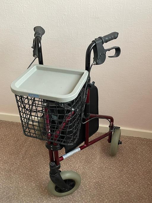  — Three wheeled walker with basked and shelf