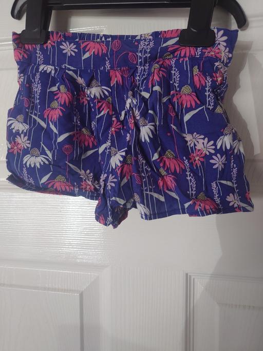  — Girls blue flower shorts size 4 years