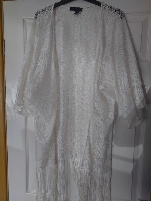  — Women's white lace cardi size 10/12