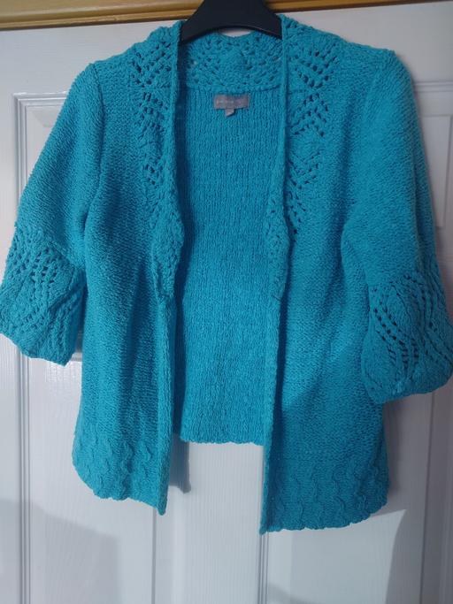  — Women's blue knitted cardigan size M