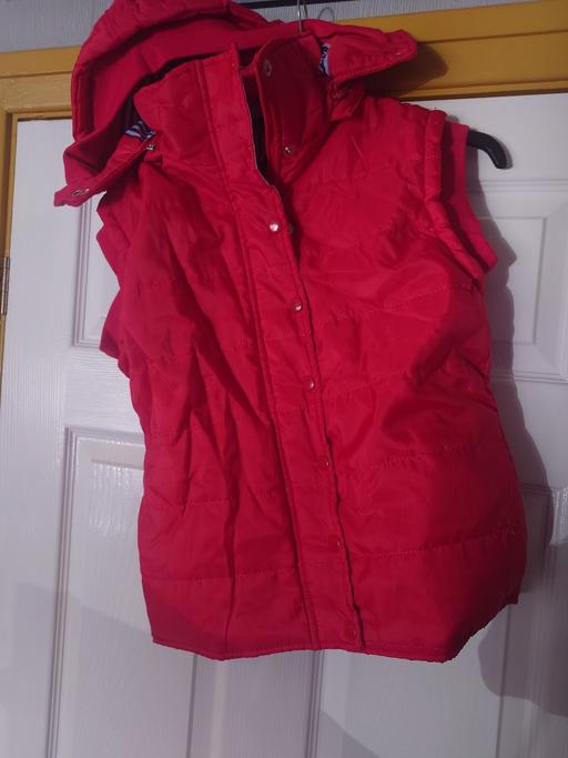  — Womens red hooded bodywarmer size M