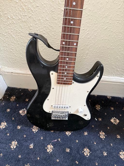  — Elevation black electric guitar