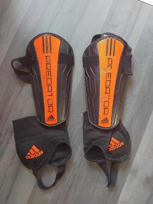  — Shinpads.