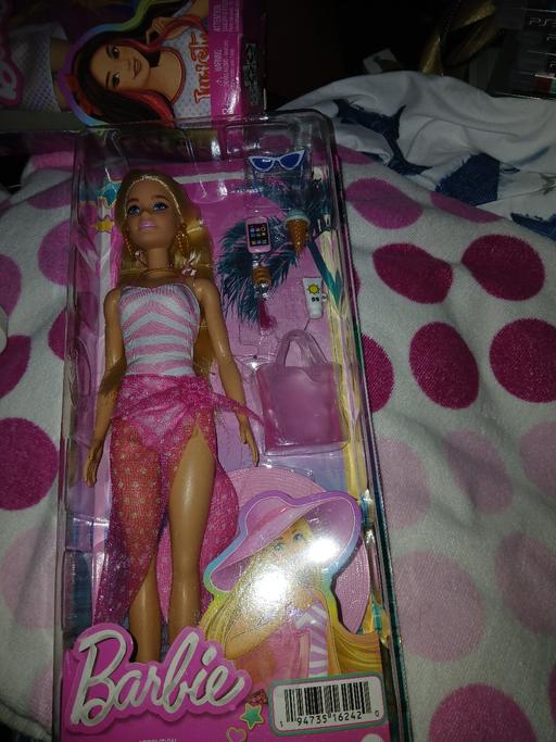  — barbie doll