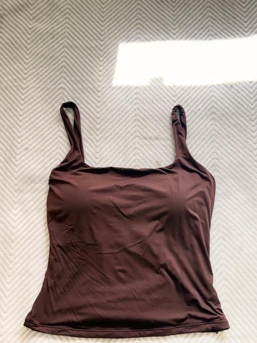  — padded brown tank top