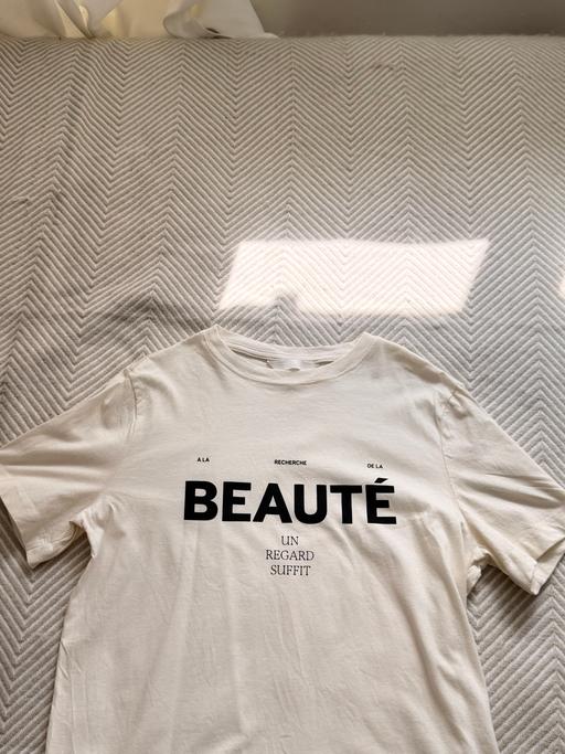  — white H&M shirt