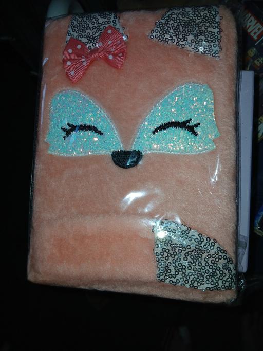  — faux fur covered notebook