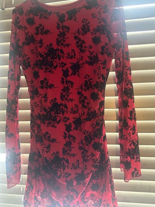  — Dress