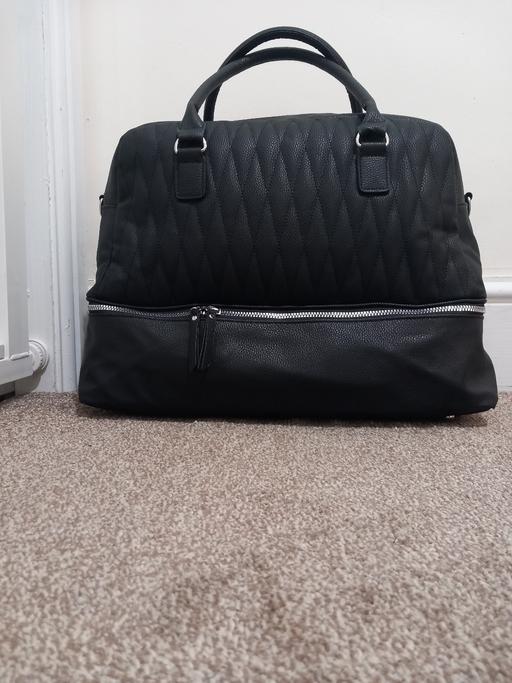  — hand luggage
