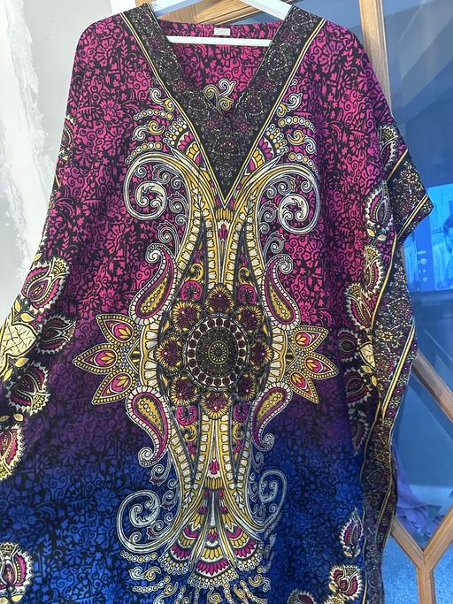  — Dress