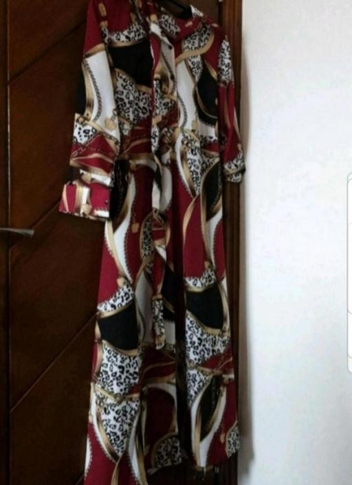  — Dress
