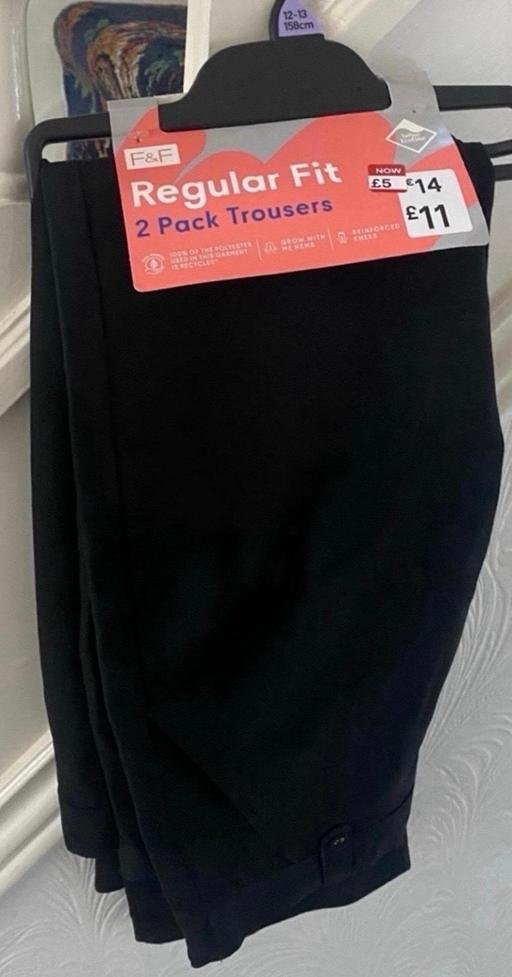  — Girls black school trousers size 12-13 years