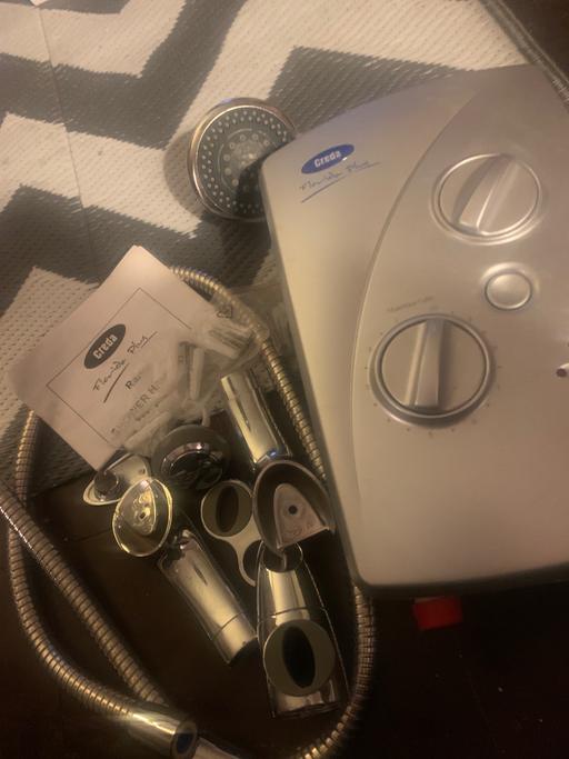  — Electric shower - never used - open to offers